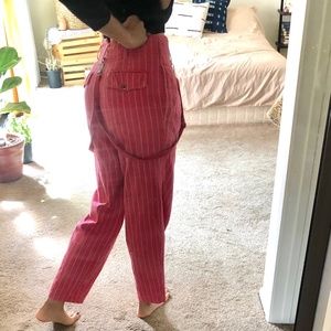 Pink high waisted trousers with pinstripes